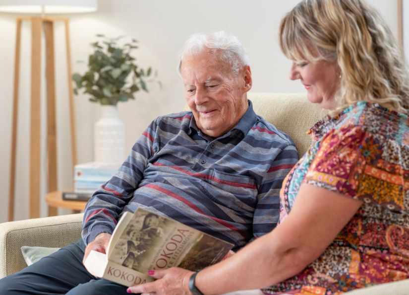 Eldercare resident Bernie spending time with his daughter at aged care home Oxford.