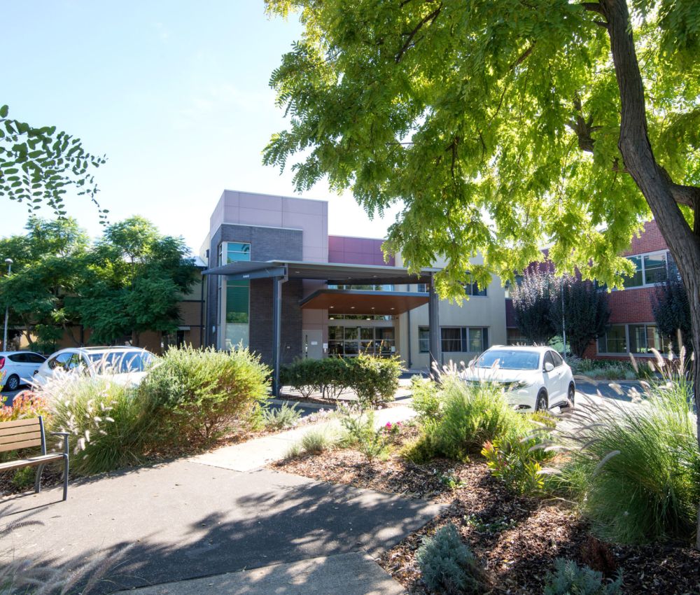 Front garden area at Eldercare Allambi with garden path.