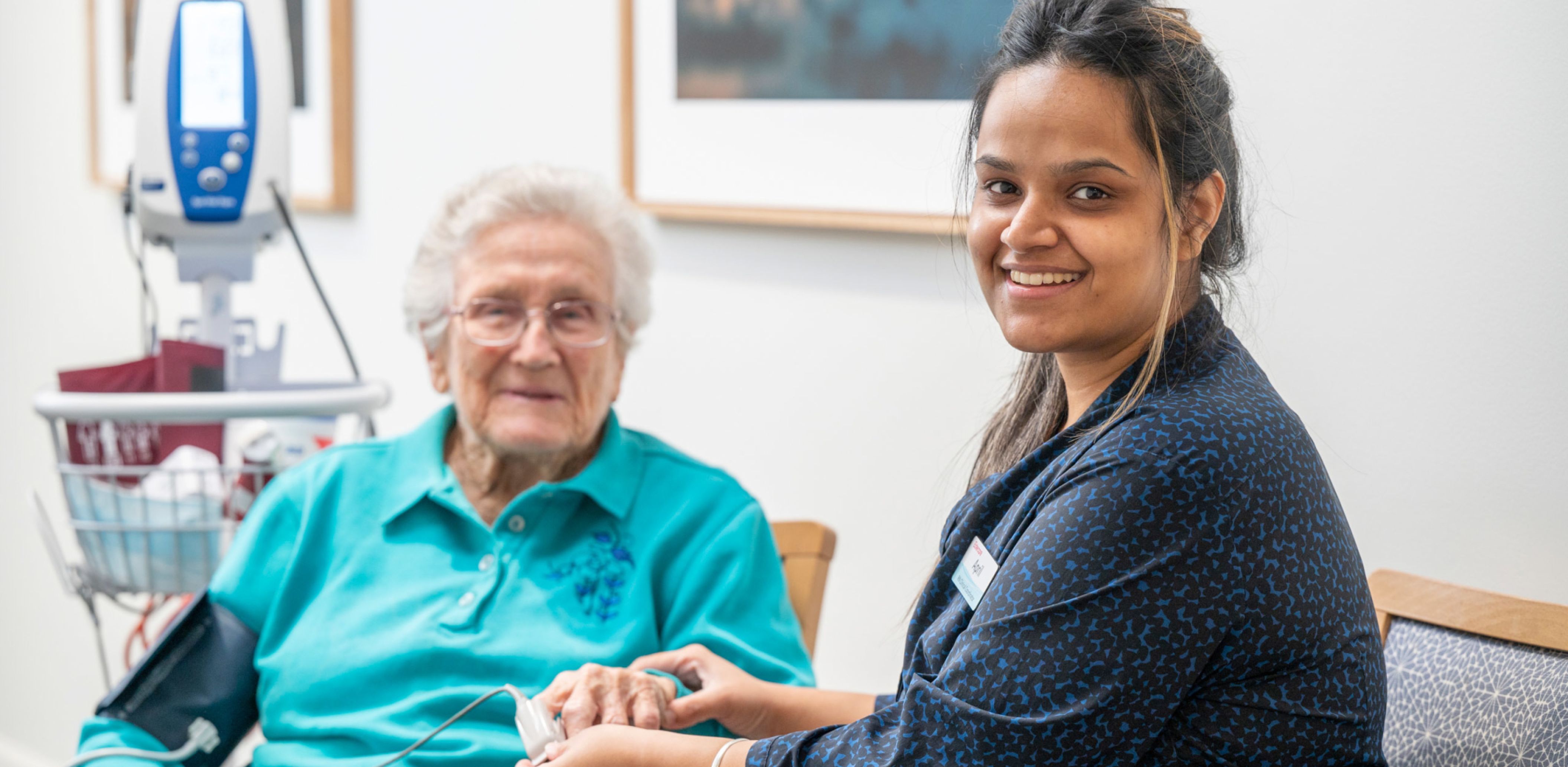 Eldercare Oxford resident and clinical leader smiling at the camera.