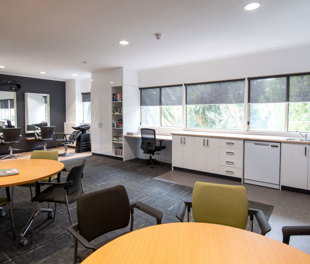 Eldercare Kingsborough Retirement Living community room and hairdresser.